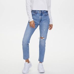 Levi’s 501 high-waisted medium-wash distressed jeans. 💙